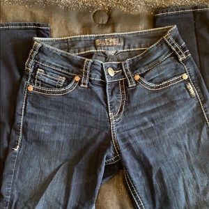 Silver Skinny mid rise jeans.